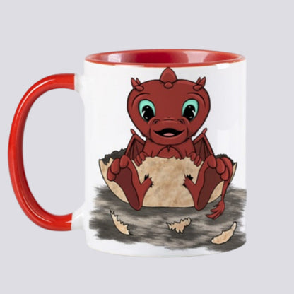 tasse en céramique design par elsa abadie penars avec l'intérieur coloré en rouge. Mug qui passe au lave-vaisselle et au micro ondes. Sur l'extérieur un dessin d'un bébé dragon rouge mignon qui sort de sa coquille